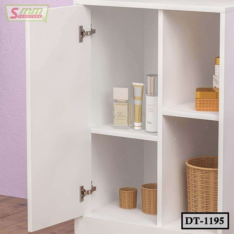 White dressing table cabinet with open shelves displaying baskets and cosmetic products