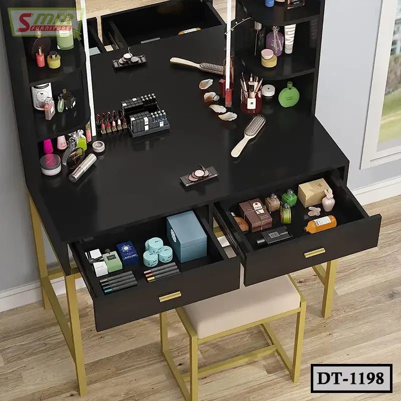 Modern black dressing table with drawers, vanity mirror, makeup and skincare items, golden legs