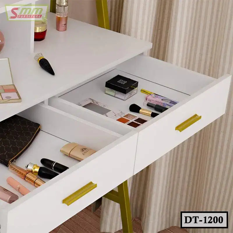 Modern white dressing table with gold handles, open drawers organized with makeup and cosmetics.