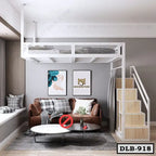 Modern duplex loft bed with stairs, brown sofa, coffee tables, and wall art in a stylish room.