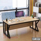 Modern executive office table with metal frame, desktop computer, and organized accessories in a workspace.