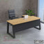 Modern executive office table with wood top, black metal legs, chair, and laptop in workspace