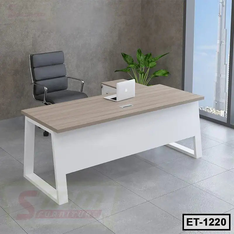 Modern executive office table with wood top, white legs, black chair, and indoor plant