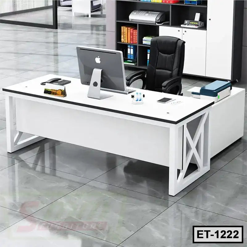 Modern white executive office table with black chair and computer in a professional workspace