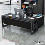 Modern executive office table with black finish and computer setup in a contemporary workspace