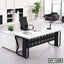 Modern executive office table with black and white finish, ergonomic chair and minimalist decor
