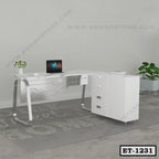 Modern white executive office table with storage drawers, laptop, and indoor plant