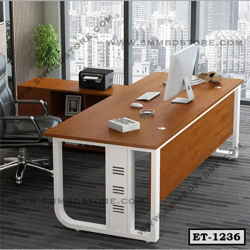 Modern executive office table with wood finish, computer, and swivel chair in a city view office Main image