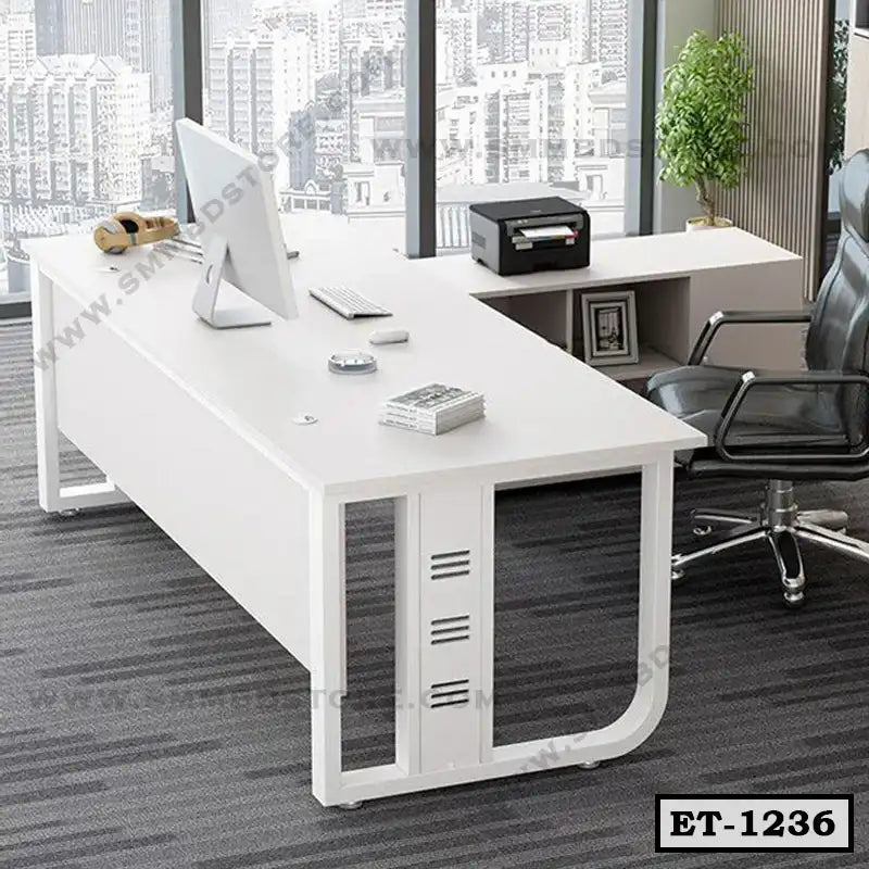 Modern white executive office table with computer, printer, and chair in a city view office