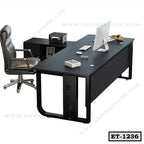 Modern executive office table with computer, printer, and ergonomic chair