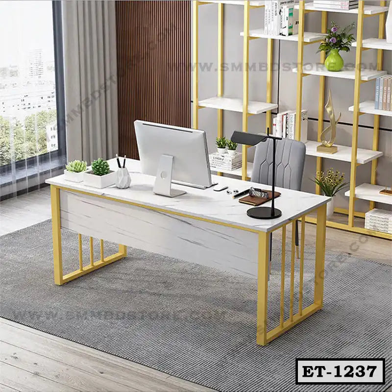 Modern executive office table with gold frame and white marble top in a stylish workspace