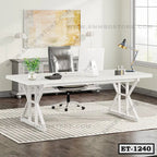 Modern white executive office table with swivel chair, desk lamp, and decor in a bright workspace