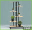 Modern flower rack with multiple shelves holding potted plants, ideal for living room or balcony.