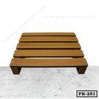 Wooden foot rest with slatted design, ideal for home or office furniture use
