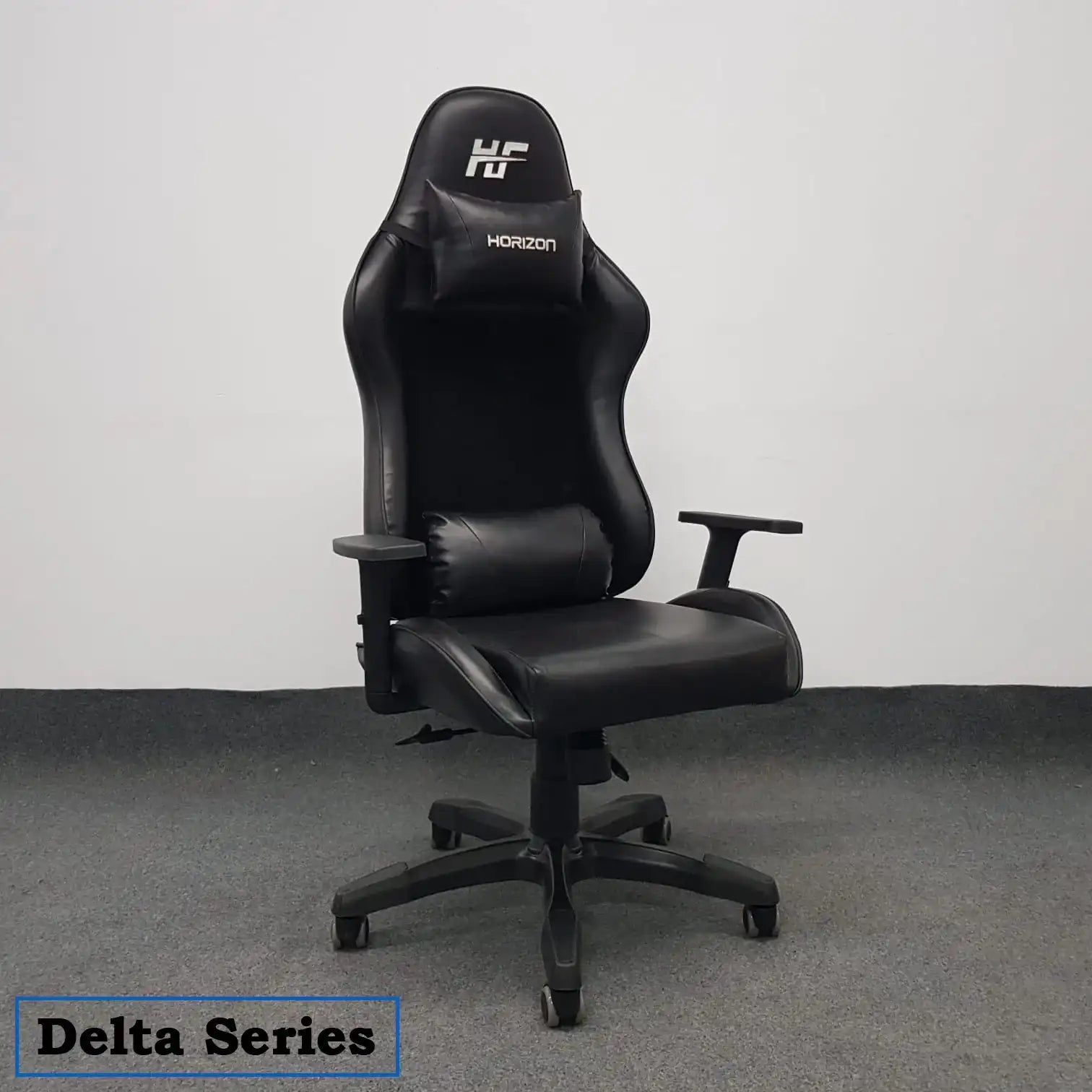 Black ergonomic gaming chair with headrest and lumbar support, Delta Series, on office carpet