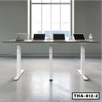Height adjustable conference table with sleek white legs, laptops, and water bottles in modern office setting.