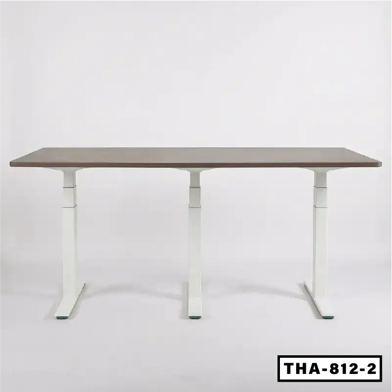 Height adjustable conference table with wood top and white metal legs on plain background