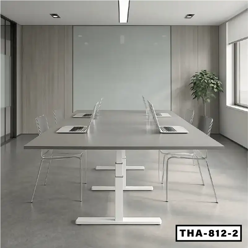 Modern height-adjustable conference table with laptops in a minimal office meeting room Main image