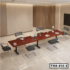 Height adjustable conference table with modern chairs in a stylish office meeting room