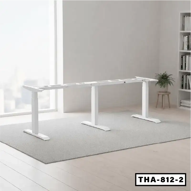 Height adjustable white conference table frame in modern office setting on grey rug