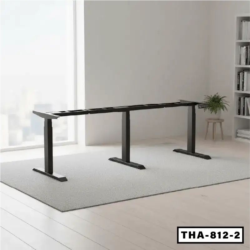 Height adjustable black metal conference table frame in modern office setting