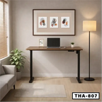 Modern home office with electric adjustable desk, laptop, indoor plant, and wall art