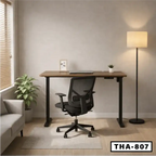Modern electric height adjustable desk with office chair in a home office setting
