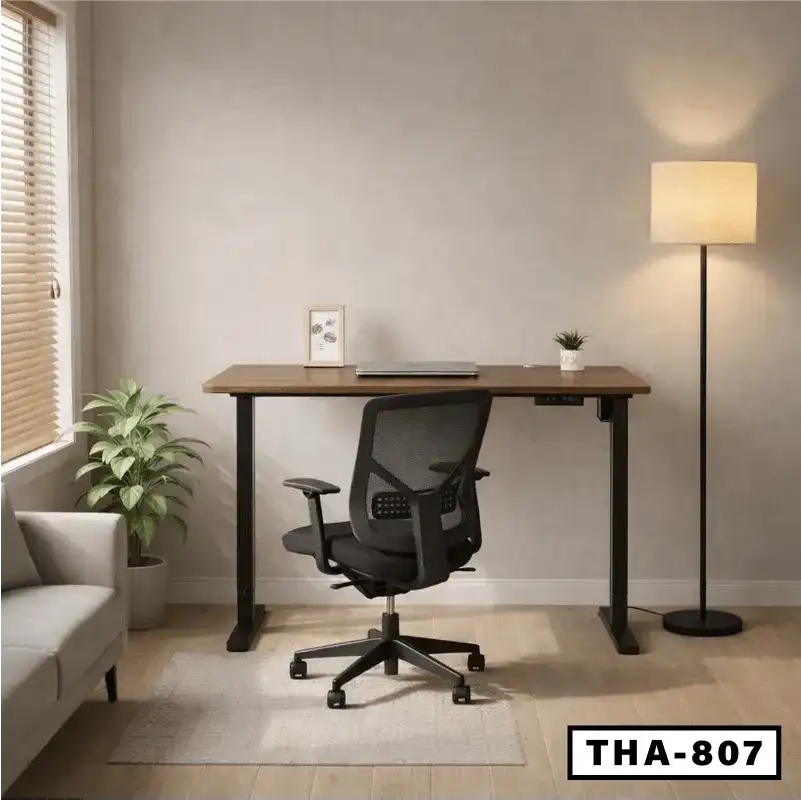 Modern electric height adjustable desk with office chair in a home office setting