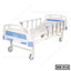 Adjustable hospital bed with side rails, blue and white, on caster wheels