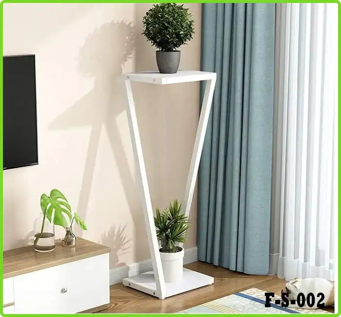 Modern indoor plant pot stand with two white shelves, holding potted plants in a bright living room corner.