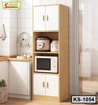 Modern wooden kitchen shelf cabinet with white doors, microwave, and rice cooker in a tiled kitchen