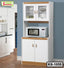 White kitchen shelf cabinet with glass doors, microwave space, and wood accents