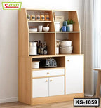 Modern wooden kitchen shelf with white cabinets, jars, appliances, and cookware displayed.