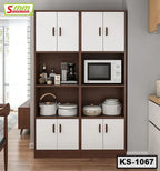 Modern kitchen cabinet with white doors, shelves holding cookware, microwave, and appliances