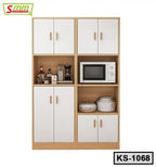 Wooden kitchen shelf unit with white cabinet doors, microwave, cookware, and small appliances.