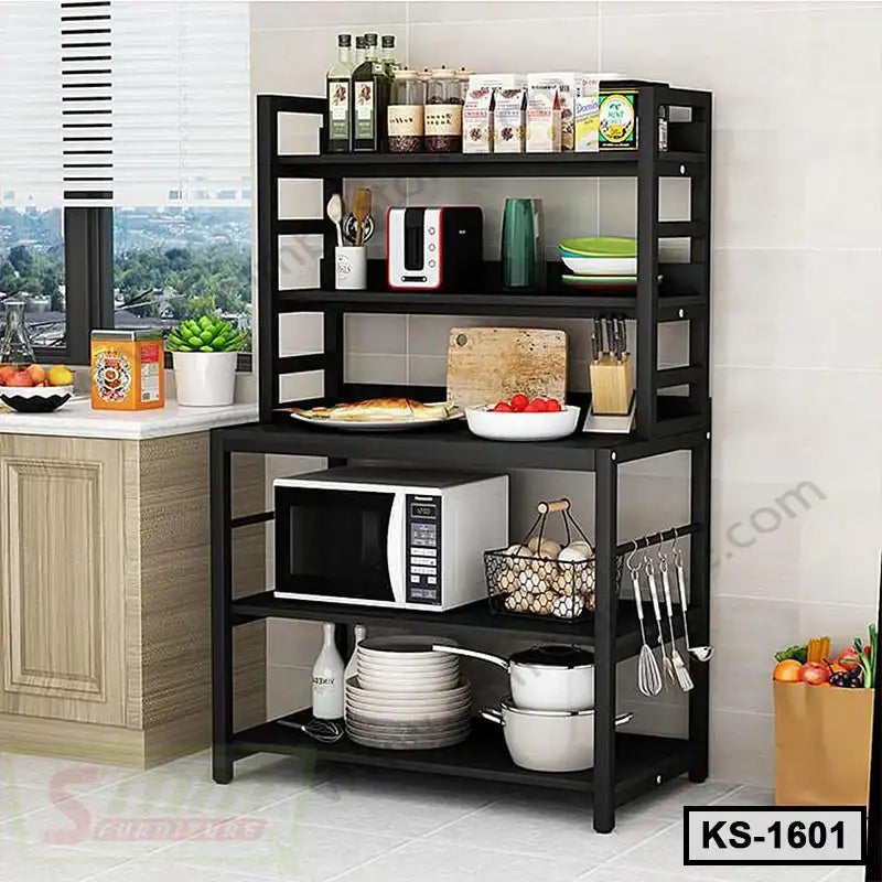 Modern black kitchen storage rack with shelves, microwave, and kitchenware in a home kitchen