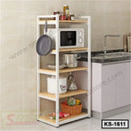 Modern kitchen shelf with microwave, cookware, and storage baskets beside sink