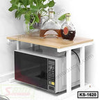 Wooden kitchen shelf organizer with microwave underneath, bottles and plant on top