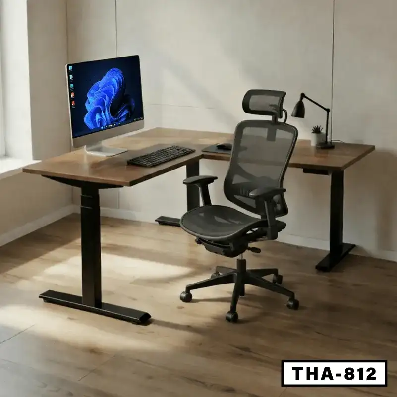 L-shaped height adjustable desk with office chair, monitor, and lamp in modern workspace