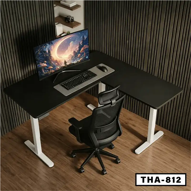 L-shaped height adjustable desk with monitor, keyboard, and ergonomic office chair