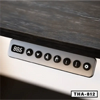 Close-up of height adjustable desk control panel with digital display and function buttons