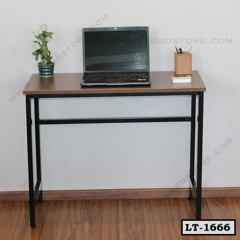 Compact laptop table with metal frame, wooden top, potted plant, and stationery on wood floor