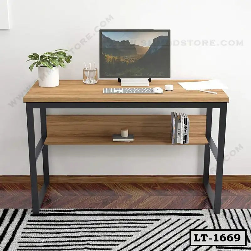 Modern wooden laptop table with metal frame, monitor, and indoor plant for home office