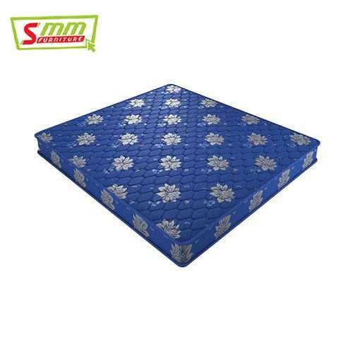 Blue floral-patterned mattress with white and silver design, single size, on white background.