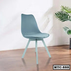 Modern metal tulip chair with cushion, light blue, on wooden floor, indoor setting
