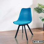 Modern blue metal tulip chair with cushion seat, black legs, on wooden floor indoors