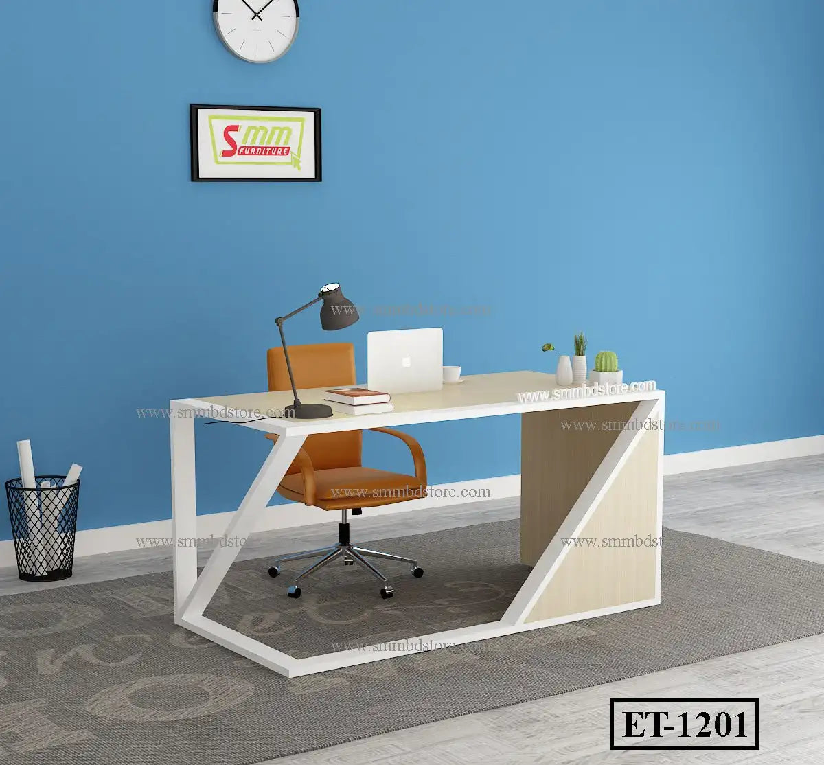 Modern office desk with light wood finish, white frame, orange chair, and desk accessories in a blue-walled room.