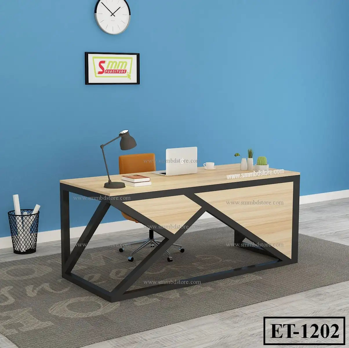 Modern office desk with black metal frame, light wood top, and minimalist workspace decor