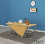 Modern office desk with triangular wood panel, lamp, laptop, chair and decor against blue wall