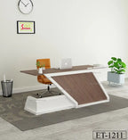 Modern executive office desk with wooden top, orange chair, laptop, and indoor plant